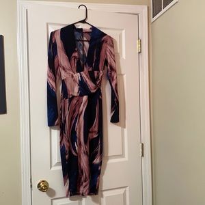 Fitted long sleeve fashion nova dress with beautiful colors.